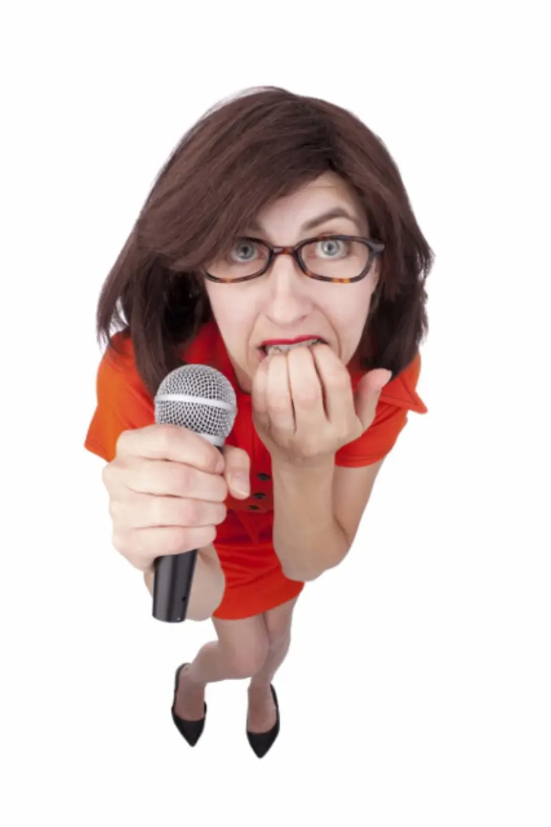 Nervous Woman Holding Microphone